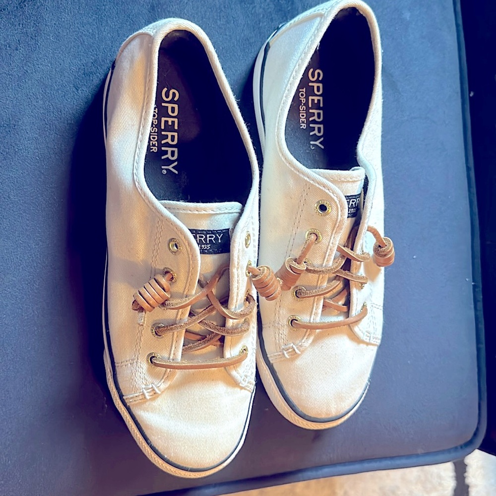 Sperry half white slip one.